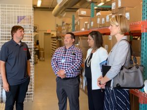 Region 9 Advocate Marina DeWit tours the City of San Luis Business Incubator facility.