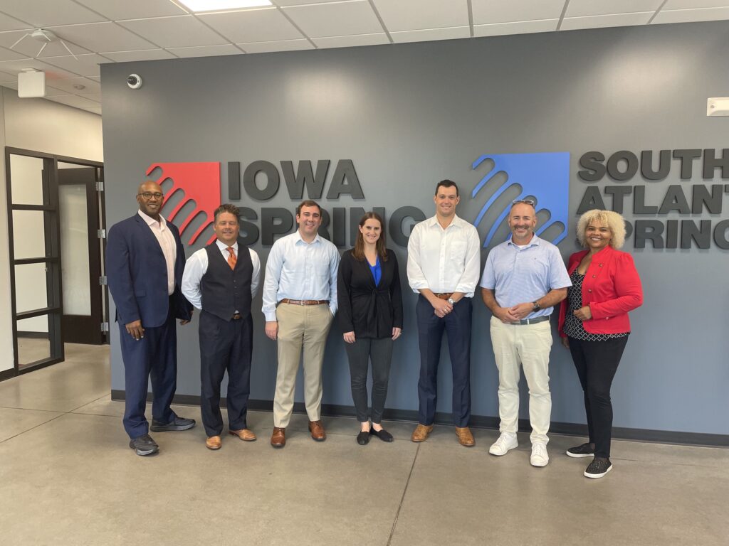 Iowa Springs Southern Atlantic Spring visit. Featured in photo from left-to-right: Will Purcell, Director Regional Affairs, Jim Langin, Director of Finance for Pivotal Business Partners, John Hollinrake, Deputy State Director, Senator Joni Ernst (IA), Ranking Member, Stephanie Fekete, Director of Interagency Affairs, Graham Owens, Regulatory & Oversight Counsel, Senator Joni Ernst (IA), Ranking Member, Tim Bianco, Owner Iowa Springs, Darcella Craven, Regional Advocate Office of Advocacy.