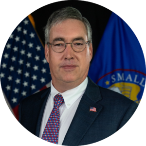 Casey B. Mulligan, Chief Counsel