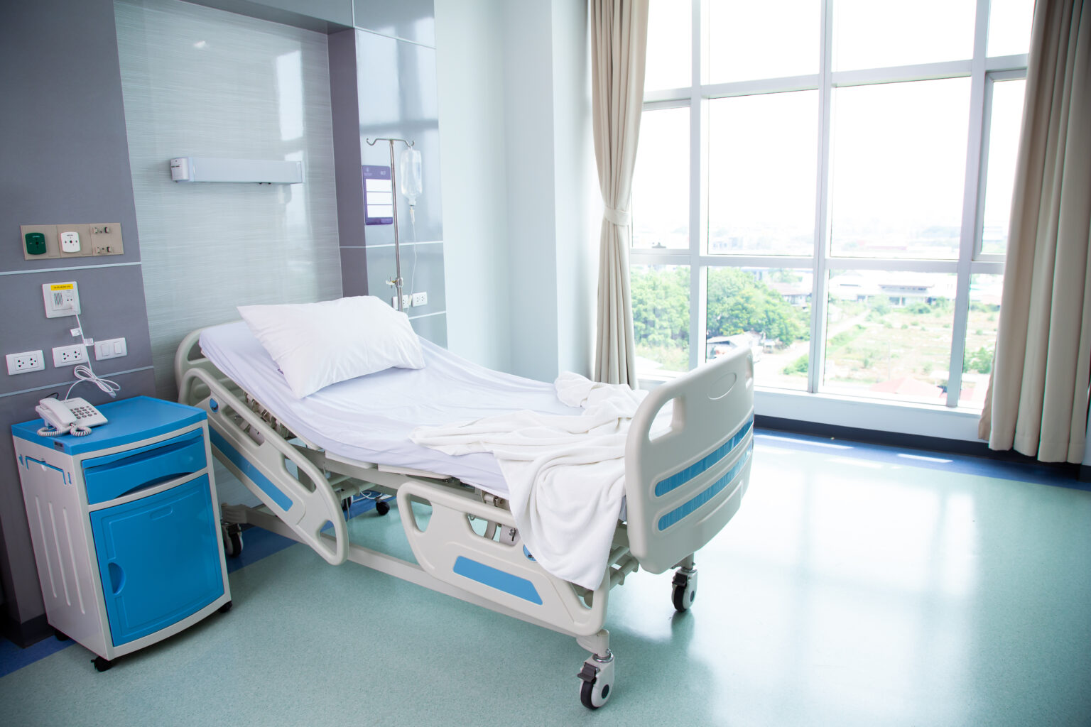 Recovery Room with beds and comfortable medical. Interior of an empty hospital room.